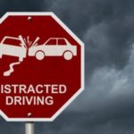 A-distracted-driving-stop-sign--540x325